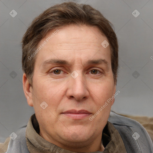 Joyful white adult male with short  brown hair and grey eyes