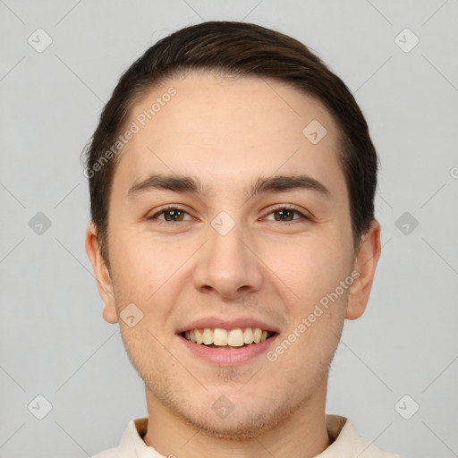 Joyful white young-adult male with short  brown hair and brown eyes