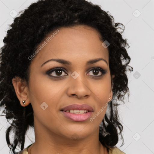 Joyful black young-adult female with long  brown hair and brown eyes