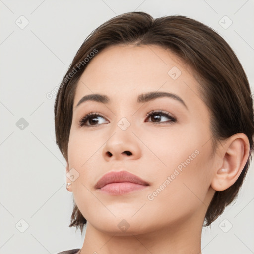 Neutral white young-adult female with medium  brown hair and brown eyes