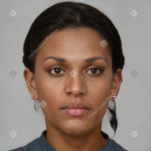 Neutral black young-adult female with short  brown hair and brown eyes