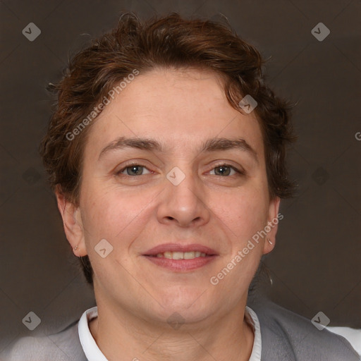 Joyful white adult female with short  brown hair and brown eyes