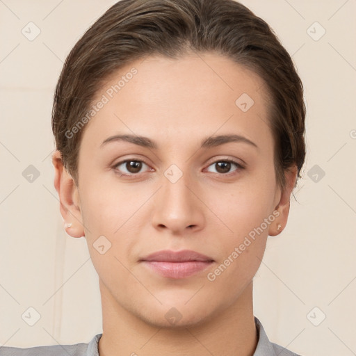 Neutral white young-adult female with short  brown hair and brown eyes