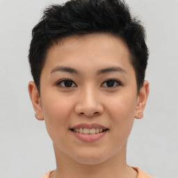 Joyful asian young-adult female with short  brown hair and brown eyes