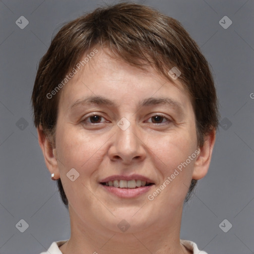 Joyful white adult female with short  brown hair and brown eyes