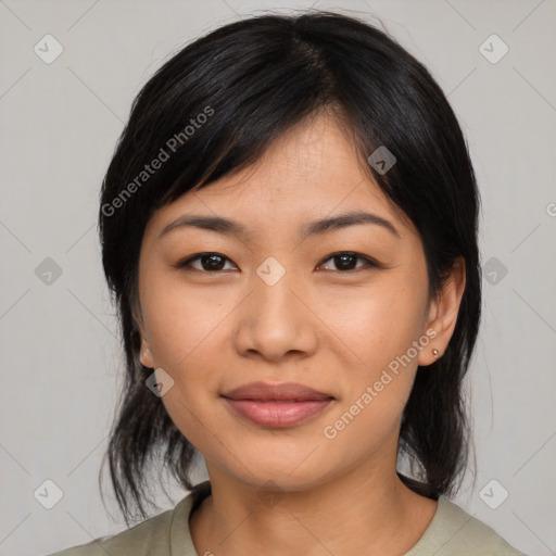 Joyful asian young-adult female with medium  black hair and brown eyes