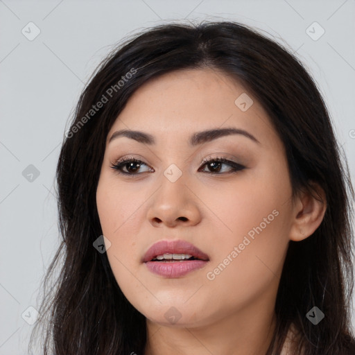 Joyful asian young-adult female with long  black hair and brown eyes