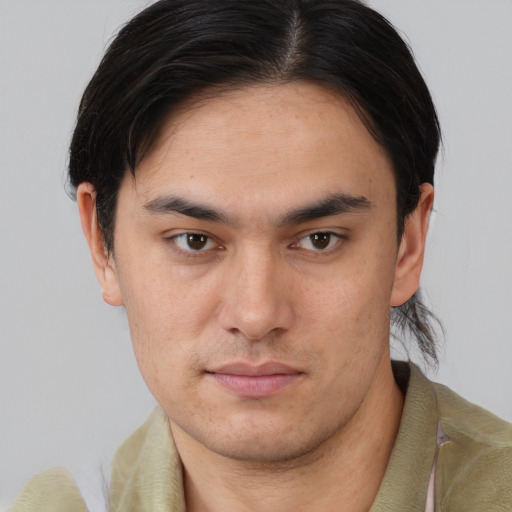 Neutral asian young-adult male with short  brown hair and brown eyes