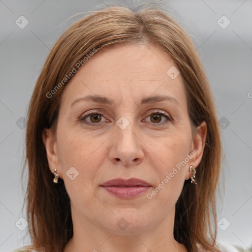 Joyful white adult female with medium  brown hair and brown eyes