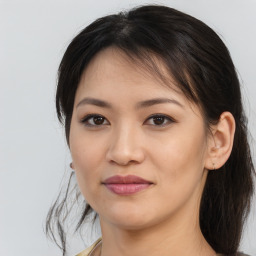 Joyful asian young-adult female with medium  brown hair and brown eyes