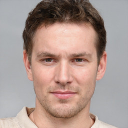 Neutral white adult male with short  brown hair and brown eyes