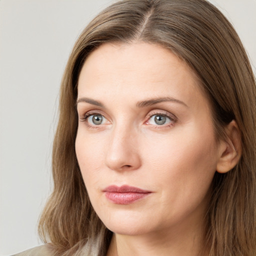 Neutral white young-adult female with long  brown hair and grey eyes