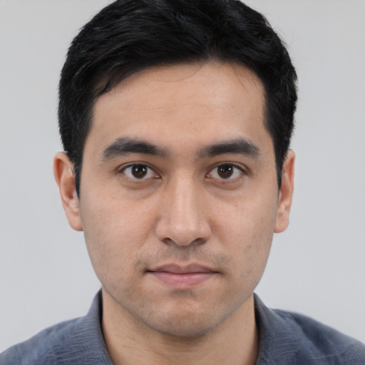 Neutral white young-adult male with short  black hair and brown eyes