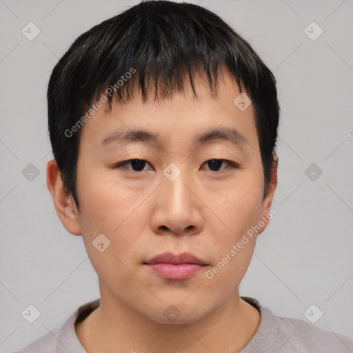 Neutral asian young-adult male with short  brown hair and brown eyes