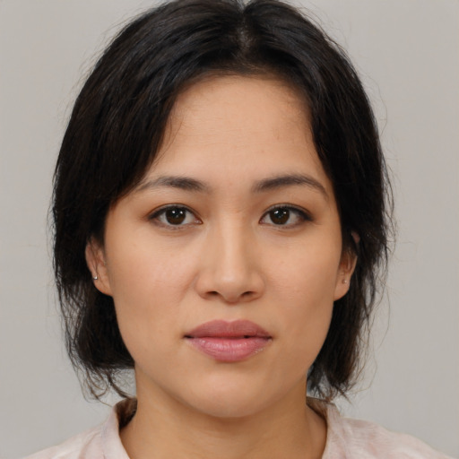 Neutral asian young-adult female with medium  brown hair and brown eyes