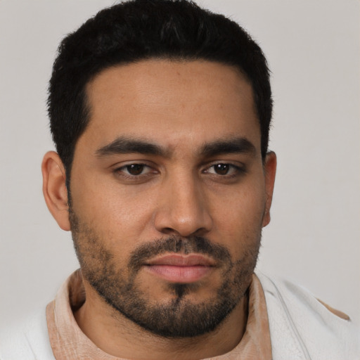 Neutral latino young-adult male with short  black hair and brown eyes