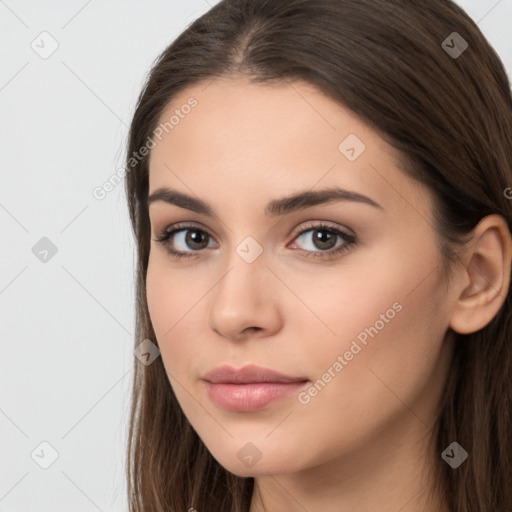 Neutral white young-adult female with long  brown hair and brown eyes