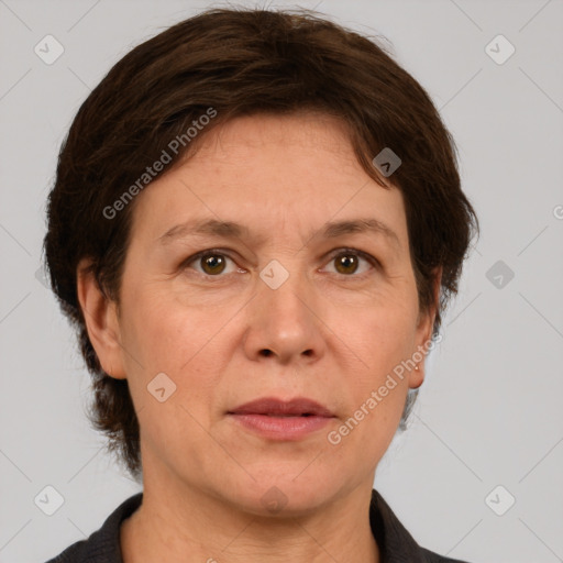 Joyful white adult female with medium  brown hair and grey eyes