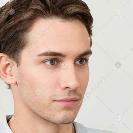 Neutral white young-adult male with short  brown hair and grey eyes