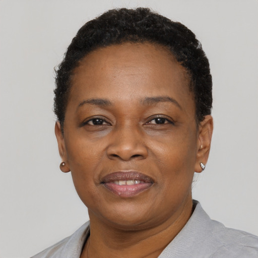 Neutral black adult female with short  brown hair and brown eyes