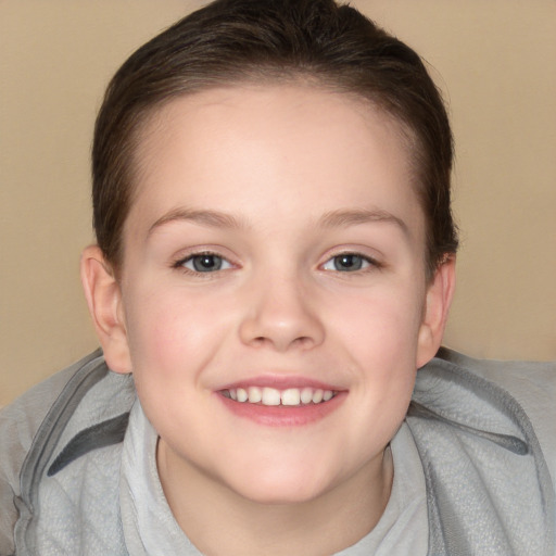 Joyful white child female with short  brown hair and brown eyes