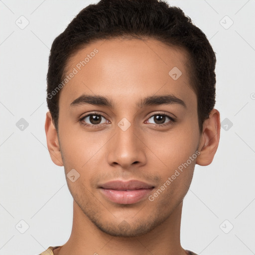 Joyful latino young-adult male with short  brown hair and brown eyes