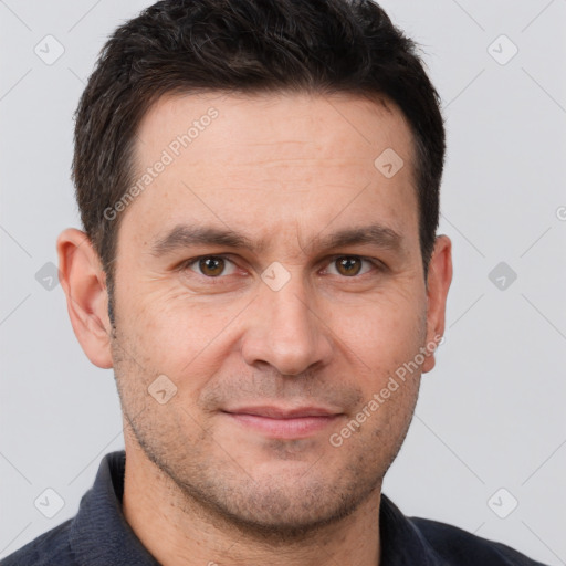 Joyful white adult male with short  brown hair and brown eyes