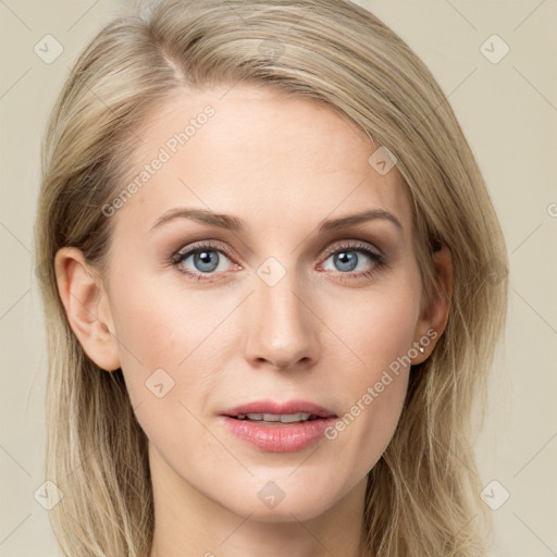 Joyful white young-adult female with long  brown hair and blue eyes