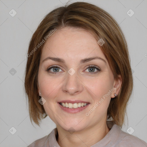 Joyful white young-adult female with medium  brown hair and blue eyes