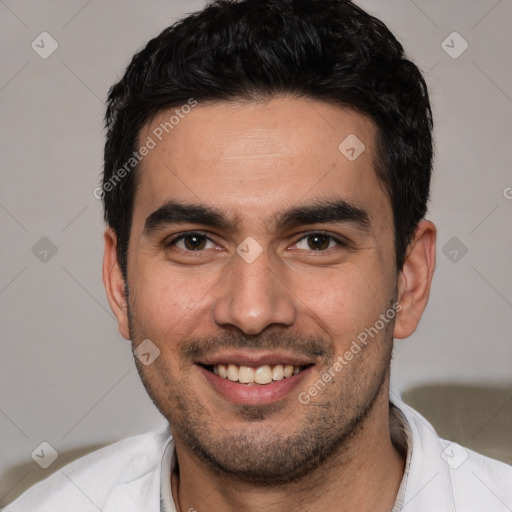 Joyful white young-adult male with short  black hair and brown eyes