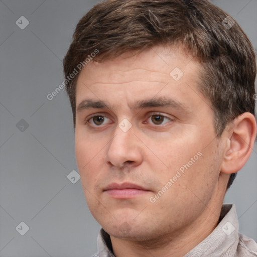 Neutral white adult male with short  brown hair and brown eyes