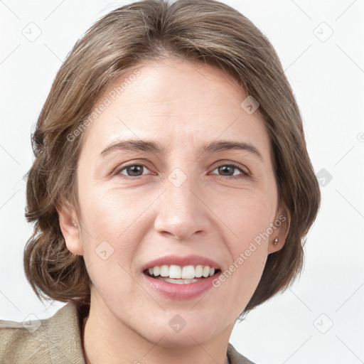 Joyful white young-adult female with medium  brown hair and grey eyes