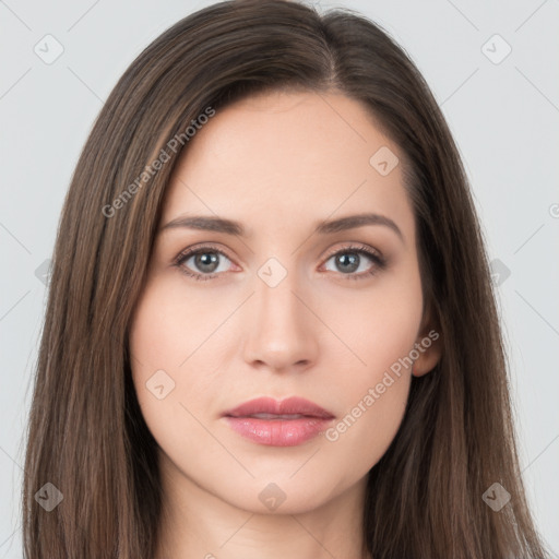 Neutral white young-adult female with long  brown hair and brown eyes