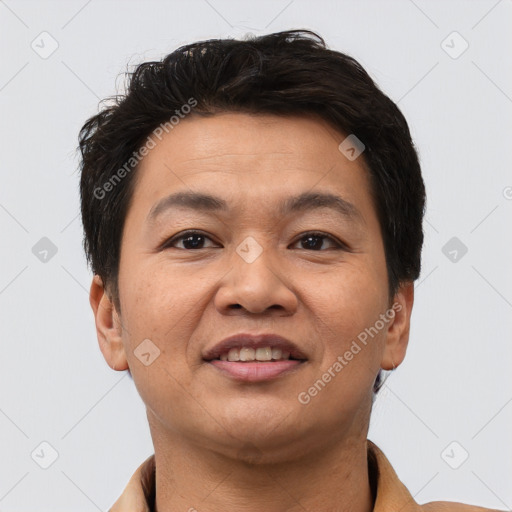 Joyful asian young-adult male with short  brown hair and brown eyes