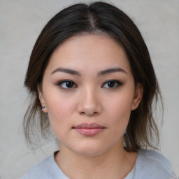 Neutral asian young-adult female with medium  brown hair and brown eyes