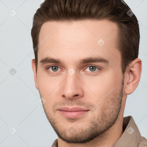 Neutral white young-adult male with short  brown hair and brown eyes