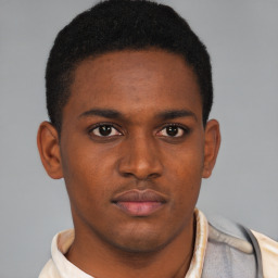 Neutral black young-adult male with short  brown hair and brown eyes