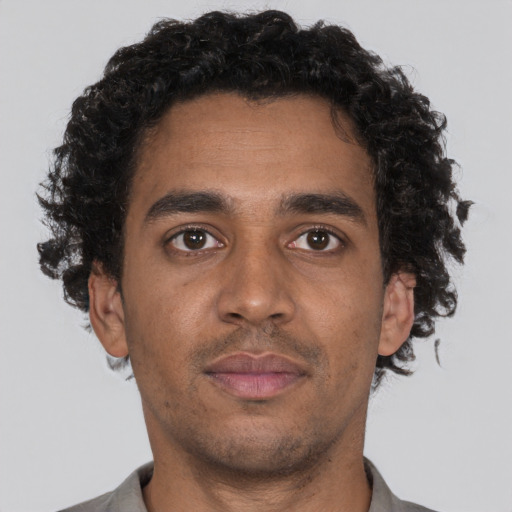 Neutral black young-adult male with short  brown hair and brown eyes