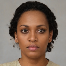 Neutral black young-adult female with short  brown hair and brown eyes