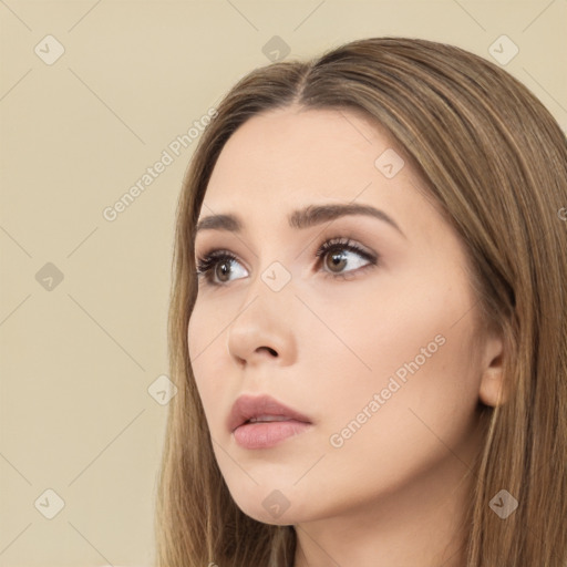 Neutral white young-adult female with long  brown hair and brown eyes