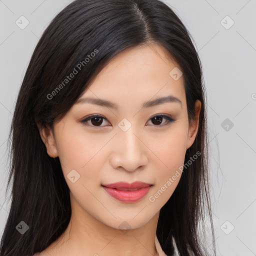 Joyful asian young-adult female with long  brown hair and brown eyes