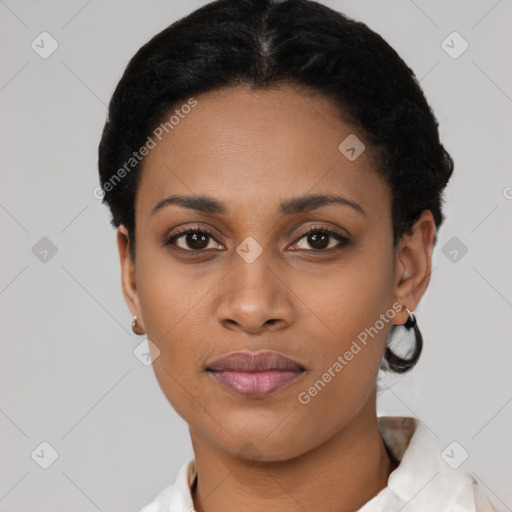 Joyful latino young-adult female with short  black hair and brown eyes