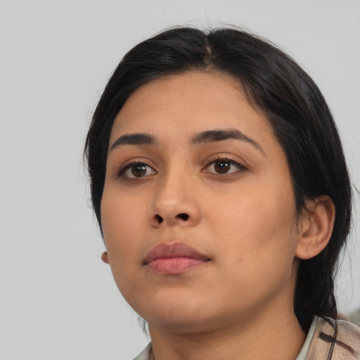 Neutral latino young-adult female with medium  black hair and brown eyes