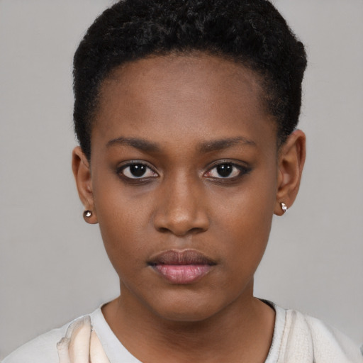 Neutral black young-adult female with short  black hair and brown eyes