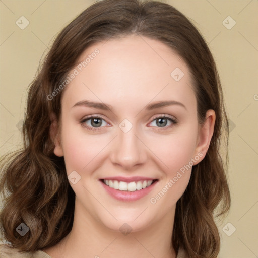 Joyful white young-adult female with medium  brown hair and green eyes