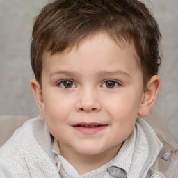 Joyful white child male with short  brown hair and brown eyes