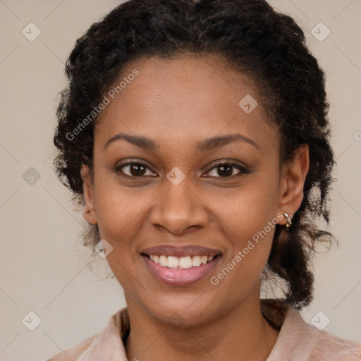 Joyful black young-adult female with medium  brown hair and brown eyes