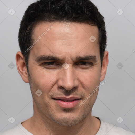 Joyful white adult male with short  brown hair and brown eyes