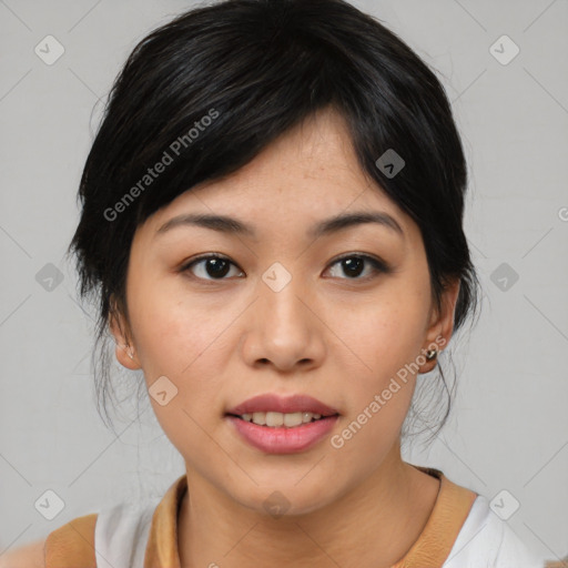 Joyful asian young-adult female with medium  black hair and brown eyes