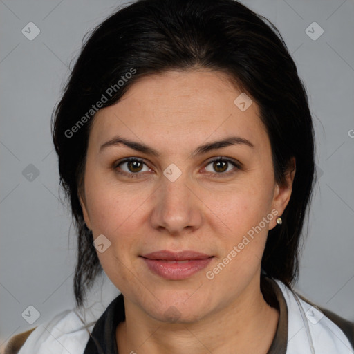 Joyful white adult female with medium  brown hair and brown eyes